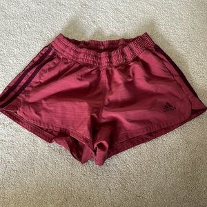 Red Adidas shorts